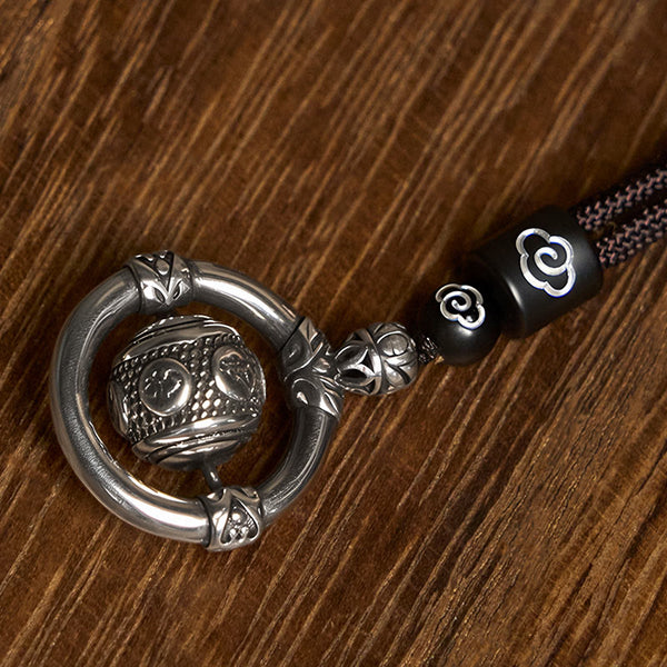 FREE Today: Wealth Wisdom Om Mani Padme Hum Copper Plated Silver Rotating Necklace Pendant